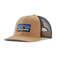 With a brim made of recycled fishing nets  the Patagonia P-6 Logo trucker hat is a classic mid-crown  6-panel trucker hat sporting an organically grown cotton front and a recycled mesh back. Patagonia Hats, Cotton Headband, Fishing Nets, Clothing Manufacturer, Ball Cap, Outdoor Outfit, Shoe Sale, Trucker Cap, Unisex Fashion