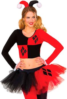 a woman in a red and black costume posing for the camera with her hands on her hips