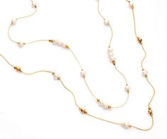 "Layered Elegant White Pearls Beads & 14K Gold-Filled Necklace for Wedding This double-strand necklace is an Elegant, delicate, and romantic necklace, that upgrades everyday moments to a special occasion. Gives you a touch of white color that lights up your face, adorned with round white pearl stones.  The necklace is delicate but stylish, layered, and classical. It gives you a touch of elegance. White Pearls Symbolic qualities: innocence, beauty, sincerity, and new beginnings.  This is what mak Elegant Yellow Gold Beaded Necklace For Formal Occasions, Elegant Yellow Gold Beaded Necklace For Formal Events, Elegant Yellow Gold Beaded Necklaces With Pearl Chain, Elegant Single Strand Gold Bridal Necklace, Elegant Gold Single Strand Bridal Necklace, Elegant Double Strand Yellow Gold Beaded Necklaces, Gold Single Strand Pearl Necklace For Wedding, Elegant Double Strand Yellow Gold Beaded Necklace, Yellow Gold Beaded Pearl Necklace For Formal Occasions