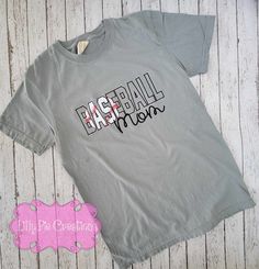 Score a home run in style with our Custom Embroidered Baseball Shirt! Show your love for your kiddos team, by adding their team name or just add "mom" below it . With customizable colors, you'll be the MVP at every game. Swing into action with this unique and personalized shirt! Are you looking for another style or color shirt? I'm happy to help! All items are made to order right here at Lilly Pie Creations Customizable Cotton Baseball Jersey For Fans, Cotton Baseball Jersey For Fan Gear With Team Spirit, Cotton Baseball Jersey For Fan Gear, Customizable Team-colored Cotton Baseball Jersey, Customizable Cotton Baseball Jersey For College, Team-colored Cotton Baseball Jersey For Sports Fans, Varsity Cotton Baseball Jersey For Fan Gear, Cotton Varsity Baseball Jersey For Fan Gear, Sporty T-shirt With Embroidered Graphics For Game Day