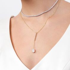 Traditional precious gemstones take on an understated wearable faceting with the Ecksand Mosaic collection. This Moonstone Drop Pendant Necklace pays tribute to Mother Nature with its showstopping, bold look. Accent stone: Moonstone 10x7mm approx. Chain width: 1mm approx. Chain length: 16 / 18 in. Chain type: Diamond-cut trace chain Closure: Lobster clasp Modern 14k Gold Jewelry In Diamond White, Minimalist Diamond White Gemstone Jewelry, Minimalist Cubic Zirconia Gemstone Jewelry, Modern Teardrop Gemstone Necklace, Elegant White Faceted Necklaces, 14k Gold Jewelry With Stones, Modern Yellow Gold Jewelry With Stones, Modern Briolette Gemstone Jewelry, Modern Cubic Zirconia Drop Jewelry