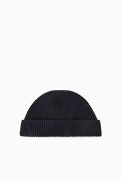 A true winter essential, this short beanie hat is crafted from merino wool and has a fold-over panel. It has a ribbed-knit construction to lock in warmth. 100% Merino wool Cos Shorts, True Winter, Beanie Style, Knitted Beanie, Wool Beanie, Winter Essentials, Knit Beanie, Hat Fashion, Beanie Hats