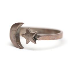 Cute vintage sterling silver cuff ring featuring a moon and star motif. Moon measures 3/8" tall, ring size 6 (and slightly adjustable). Silver Sterling Moon Midi Rings, Silver Moon-shaped Sterling Midi Rings, Silver Star-shaped Celestial Midi Rings, Celestial Moon-shaped Sterling Silver Rings, Moon Star Ring, Silver Cuff Ring, Watch Cufflinks, Star Motif, Cuff Ring