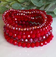 Set of 8 Red Glass Crystal Bead Bracelets  Smooth & Comfortable Size 18 cm Stretch Band to Fit Most Sizes  Arrives in Gift Box  Fast Shipping Red Christmas Jewelry With Colorful Beads, Red Faceted Beads Bracelet, Red Faceted Beads Jewelry For Christmas, Red Round Beads Jewelry For Christmas, Red Stretch Bracelet For Christmas Holiday, Red Beaded Christmas Jewelry, Traditional Red Faceted Beads Bracelet, Holiday Red Adjustable Jewelry, Red Beaded Bracelets With Spacer Beads For Party