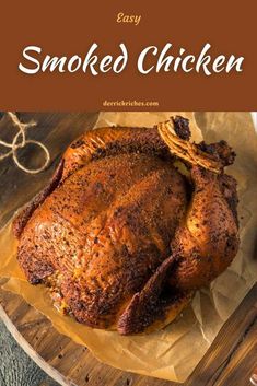 an easy smoked chicken on a cutting board with the title text overlay reads easy smoked chicken