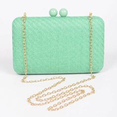 This Khaki Wicker Clutch is a must-have summer accessory. The hard clutch design is perfect for a day at the beach or a night out on vacation. With a removable chain, it can be worn as a crossbody for added convenience. Elevate your summer fashion game with this versatile and stylish piece. Green Day Out Bag For Beach Season, Chic Summer Bag With Chain Detail, Chic Summer Shoulder Bag With Chain, Casual Shoulder Bag With Chain Strap For Vacation, Spring Vacation Shoulder Bag With Chain Strap, Summer Shoulder Bag With Chain For Everyday Use, Summer Beach Crossbody Clutch, Summer Chain Shoulder Bag For Everyday Use, Green Crossbody Clutch For Evening