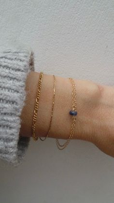 Before placing an order please check the estimated shipping times. If you need your order in a hurry shipping upgrades are available. Thank you. This little bracelet made with high quality materials makes a great gift. D E T A I L S *It features an AAA quality kyanite crystal that has been beautifully cut to make it extremely sparkly. *It is attached to delicate 14k gold filled chain that has been doubled over. *Gold filled is a wonderful alternative to solid gold and unlike gold plating does no Elegant Blue Chain Bracelet For Everyday, Delicate Blue Bracelets For Everyday, Blue Dainty Birthstone Bracelets, Dainty Gemstone 14k Gold Filled Bracelets, Elegant Blue Bracelets With Delicate Chain, Blue 14k Gold Everyday Bracelets, Elegant Blue Bracelet With Delicate Chain, Everyday Blue 14k Gold Bracelets, Minimalist Blue Bracelet With Delicate Chain