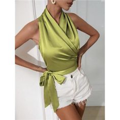 Elevate Your Look With This Chartreuse Green Satin Crop Top, Designed To Make A Statement. The Halter Neckline And Knot Wrap Detail Create A Flattering, Slim Fit That Highlights Your Shape. Sleeveless And Made From Non-Stretch Satin, It Offers A Smooth, Polished Finish. With No Sheer Elements, This Crop Top Is Both Stylish And Versatile, Perfect For Pairing With High-Waisted Bottoms Or Layering Under A Blazer. Chic V-neck Blouse, Elegant Summer Halter Top, Green Sleeveless Halter Top For Party, Green Sleeveless Tank Top For Night Out, Green Sleeveless Blouse Tank Top, Elegant Spring Halter Tank Top, Casual Sleeveless Blouse For Party, Chic Sleeveless Blouse For Summer, Chic Sleeveless Summer Blouse