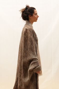 This handmade wool kimono coat/ wrap is handmade in a nuno felt technique from 100% wool in natural brown and beige on a cotton fabric. It is very soft  lightweight and warm. It has a loose blanket coat shape that fits perfectly every body shape and it comes in S/M/L/XL  but if you need a special size, please let me know - I will be happy to make one especially for you. The model is wearing S size. I carefully make each coat myself using only cruelty free wool and natural materials in my "slowla Wool Kimono, Wool Jackets, Nuno Felt, Fabric Gift Wrap, Kimono Coat, Blanket Coat, Brown And Beige, Oversized Scarf, Nuno Felting