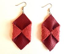 These modern earrings are hand-crafted from real leather. The unique geometric design is sure to make a statement! They hang from either a nickel or antique brass toned fishhook ear wire, depending on the color selected. The earrings are made upon order, so if you have any special requests, please contact me and I will try to meet your specific needs. (Earrings in photo are Dark Brown.) The leather used comes from repurposed upholstery samples that have been diverted from the landfill thanks to Handmade Brown Geometric Earrings, Red Leather Earrings For Gifts, Brown Geometric Earrings Gift, Brown Geometric Earrings As Gift, Leather Gifts For Her, Map Ornaments, Leather Jewellery, Bookclub Gifts, Jewelry Real