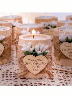 many small candles with hearts and flowers on them