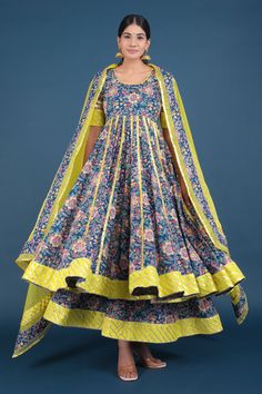 Blue anarkali with spring print and metallic panels. Paired with printed skirt and printed hem dupatta.
Component: 3
Pattern: Printed
Type Of Work: Spring
Neckline: Round
Sleeve Type: Half
Fabric: Anarkali and Skirt: Cotton, Dupatta: Organza; Lining: Cotton
Color: Blue
Other Details: 
Printed hem dupatta
Back tassel tie-up
Occasion: Puja - Aza Fashions Eid Blue Lehenga With Printed Motifs, Blue Lehenga With Printed Motifs For Eid, Blue Anarkali Lehenga With Floral Print, Bollywood Anarkali Set With Kalamkari Print, Bollywood Style Kalamkari Anarkali Set For Eid, Blue Kalamkari Anarkali Set For Eid, Blue Kalamkari Print Anarkali Set For Eid, Blue Bollywood Salwar Kameez With Kalamkari Print, Blue Kalamkari Salwar Kameez For Diwali