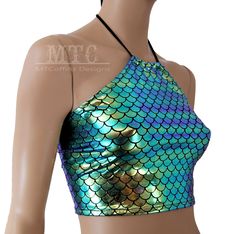 Dragon Scales Holographic Gold Mermaid Scales Glitter Halter Corset lacing adjustable size boho Rave Festival Halter Top - MTCoffinz This summer halter top is made with soft and stretchy holographic lycra. Its a Dragon Scale / Mermaid Scale with color Shift The top laces in the back with hand set industrial grommets. If you love this style but not the print,I can make it for you with any of the lycra you see in my shop, feel free to request custom print. If you want to make an outfit of this pri Fitted Bohemian Halter Top For Party, Blue Stretch Halter Top For Festival, Adjustable Halter Top For Summer Party, Adjustable Green Halter Top For Summer, Green Fitted Bohemian Halter Top, Fitted Green Halter Top For Festival, Mermaid Workout, Mermaid Rave Outfit, Mermaid Clothes