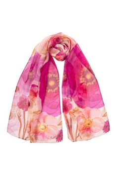 Named after the famous piazza in Rome, Campo de' Fiori (field of flowers), this sheer silk Georgette long scarf has a floral print. 100% Made in Como, Italy. Figure flattering size: Approx. 20” x 67". Years of trial and error taught us that this size scarf is one of the simplest to style and makes every woman look chic. 100% Silk Georgette: A lightweight, sheer crepe-style fabric characterized by its crinkly, pebbly texture and excellent drape that is often used in high-end fashion. It has a dul Pink Floral Print Feminine Scarves, Pink Feminine Floral Print Scarves, Feminine Pink Floral Print Scarves, Pink Floral Print Silk Scarves, Pink Silk Scarf With Floral Print, Silk Floral Print Scarves For Summer, Pink Floral Print Silk Scarf, Pink Floral Print Scarves For Spring, Pink Floral Print Scarf For Spring