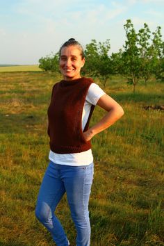 Embrace a touch of boho elegance with our handmade rustic brown crochet vest, crafted from high-quality wool for a cozy and comfortable fit. This sleeveless top is perfect for layering over your favorite shirts or dresses, adding a stylish flair to any outfit. Whether you're dressing up for a casual outing or layering for a chilly evening, this vest provides both warmth and style. DETAILS: -- Wool, Acrylic blend -- Comfortable wearing with your favorite winter coat or bomber jacket -- Weight: ~300g CARE INSTRUCTIONS: -- Machine wash on delicate cycle -- Do not tumble dry -- Do not bleach -- Dry cleanable -- Dry flat NOTES: -- Colours may vary slightly due to lighting and your device's screen settings. -- Please get in touch with us if you have a special request. Brown Knit Vest For Layering, Brown Knitted Sweater Vest For Layering, Brown Knitted Sleeveless Top, Brown Knit Vest Top, Fall Season Sleeveless Crochet Top For Layering, Fall Sleeveless Crochet Top For Layering, Brown Sweater Vest For Layering, Brown Knit Sleeveless Vest, Brown Vest Sweater For Fall