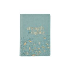 a blue book with gold lettering and leaves on the cover, which reads strength and dignity