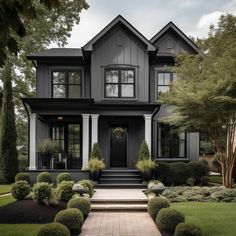 Black Rendered House Exterior, Dark Rendered House Exterior, Black Roof Grey House, Dark Grey And Black House Exterior, Black Stucco House Exterior, Grey And Black House Exterior, Grey House Black Trim, Dark Grey House Exterior, House With Black Trim