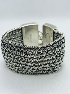 "Silver vintage Lois Hill heavy, wide, woven and braided mesh toggle bracelet. The bracelet measures 7\" in length and 1\" in width. It is stamped \"Lois Hill\" \"Indonesia 925\" and weighs 73 grams. This bracelet is in an excellent condition. All items are shipped in a pouch in a box with free gift packaging." Lois Hill Jewelry, Toggle Bracelet, Braided Bracelets, Gift Packaging, In A Box, A Box, Free Gift, Cuff Bracelets, Free Gifts