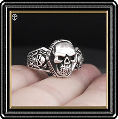 "Material is .925 Sterling Silver Ring Sizes Are 9 to 12-US. Half sizes are available so convo us! Triple Skull Biker Ring. Made in Sterling Silver with a good goth design in mind. Nice details throughout the design. Many have asked for lower priced items so here you go. We will try to have more medium weight pieces as time permits. Enjoy. Casting by Rainbow. \"We Do Not\" ship to Thailand. Export Only! Thanks." Silver Skull Ring For Biker Events And Halloween, Vintage Skull Ring For Halloween Collectible, Collectible Gothic Skull Ring, Gothic Hallmarked Rings For Collectors, Gothic Silver Skull Ring For Biker Events, Vintage Sterling Silver Rings For Halloween, Vintage Sterling Silver Ring For Halloween, Biker Jewelry For Halloween Gift, Biker Style Jewelry For Halloween Gift