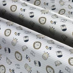 three different types of wallpaper with clocks and animals on them, all printed in various colors