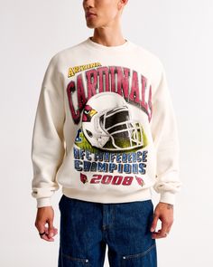 Elevate your game day ensemble with the Men's Arizona Cardinals Graphic Crew Sweatshirt from Abercrombie & Fitch. This piece combines comfort and style, making it a must-have for any fan.

- Size: XL TALL
- Color: Cream
- Material: Cotton, Polyester
- Gender: Male
- Features: Crew neckline, banded hem and cuffs, Arizona Cardinals graphic on the chest

Crafted in our exclusive softAF fleece fabric, this sweatshirt offers an oversized fit that ensures ease of movement and ultimate comfort. Whether Male Features, Classic Sweatshirt, Arizona Cardinals, Men's Tops, Philadelphia Eagles, Crew Sweatshirts, Hoodie Top, Cardinals, Fleece Fabric