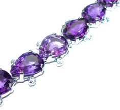 Handmade Unique 925 Sterling Silver bracelet with unique one of a kind Amethyst,  22.30 grams of marvelous handcrafted jewelry design. Only one piece availble ready to ship! It's unique worldwide bracelet - simply piece of art in world of fine jewelry. Authentic  faceted Amethyst  .925   Sterling Silver handcrafted Bracelet  BRACELET DETAILS: Weight: 22.30g; Material: Sterling Silver; Main stone: Amethyst; Other stones: White Topaz; Width (widest section): 1/2 inch; Inner circumference: 7  inch; Amethyst Bracelet In Fine Jewelry Style, Fine Amethyst Jewelry, Purple Fine Jewelry Bracelet, Sterling Silver Amethyst Gemstone Bracelet For Anniversary, Fine Jewelry Amethyst Bracelets Gift, Amethyst Bracelet Fine Jewelry, Formal Amethyst Gemstone Sterling Silver Bracelet, Amethyst Gemstone Bracelet Jewelry, Unique Silver Jewelry