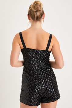 You'll radiate with undeniable glamour when you strut in wearing the Lulus Alluring Glow Black Sequin Sleeveless Bustier Romper! Glittery black sequins create an ultra-subtle diamond pattern across this impressive romper that features a bustier-style bodice with seamed cups and a flirty sweetheart neckline, supported by stretchy elastic tank straps. The fitted waist tops a pair of cute shorts that will perfectly show off your favorite pair of heels! Hidden back zipper/clasp. Fit: This garment fi Strapless Evening Tank Top With Built-in Bra, Fitted Sequin Tank Top For Night Out, Fitted Sleeveless Sequin Fabric For Night Out, Chic Sleeveless Sequin Fabric For Party Season, Glamorous Black Tank Top For Evening, Glamorous Black Evening Tank Top, Elegant Tank Top With Sweetheart Neckline For Party, Elegant Party Tank Top With Sweetheart Neckline, Elegant Sweetheart Neckline Tank Top For Party