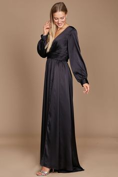 Are you trying to find the ideal long dress that will make you feel both gorgeous and at ease? Check out this gorgeous long-sleeved formal dress! It has a chic split a-line skirt that will accentuate your attractive legs, a trendy and elegant peplum-style bodice, and romantic long sleeves. Elegance, beauty, and comfort are personified in this outfit. Excellent for any special event! Fabric: Satin Length : Full Length Sleeve Style : Long Sleeve Color : Black, Navy Sizes : 8, 10, 12, 14, 16, 18, 2 Long Sleeve Satin Dress For Date Night, Long Sleeve Dressy Prom Dress, Long Sleeve Dressy Dress For Prom Season, Long Sleeve Dressy Dress For Prom, Chic A-line Maxi Dress For Dinner, Elegant Long Sleeve Floor-length Dress For Night Out, Elegant Long Sleeve Evening Dress For Night Out, Dressy Long Sleeve Evening Dress, Chic Long Sleeve Prom Dress