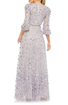 Three-dimensional blooms adorn this floor-grazing gown made with a soft mesh overlay on top of sweet lace that brings romance to your party-ready look. 61" length Back zip closure Jewel neck Three-quarter sleeves Partially lined 100% polyester Spot clean Imported Asian Owned/Founded Lace Evening Dress With Floral Applique For Gala, Gala Lace Evening Dress With Floral Applique, Gala Evening Dress With Floral Applique Lace, Gala Lace Gown With Floral Applique, Lace Floral Applique Gown For Gala, Floral Applique Lace Gown For Gala, Lace Evening Dress With Floral Applique, Spring Gala Lace Mother Of The Bride Dress, Spring Gala Mother Of The Bride Lace Dress