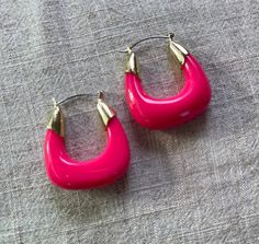 Gorgeous and Fun Enamel Earrings! These should be a staple in your jewelry collection. We love when we are doing a monochromatic look and add these pieces to it. It looks very stylish ! You will really love them! Measures: 2" Chic Small Pink Hoop Jewelry, Chic Small Hoop Pink Jewelry, Chic Pink Small Hoop Earrings, Chic Small Pink Hoop Earrings, Lucite Hoop Earrings As Gift, Trendy Pink Enamel Earrings, Pink Enamel Hoop Earrings, Red Enamel Round Earrings, Multicolor Enamel Hoop Earrings