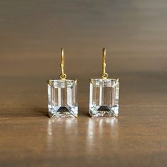 Rosanne Pugliese Small Emerald Cut White Topaz Earrings – Meeka Fine Jewelry Gold Earrings Studs Simple, Emerald Cut Earrings, White Topaz Earrings, Gold Frames, Cut Earrings, Design Movements, Newport Ri, Topaz Earrings, Earrings Studs