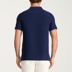 Versatile and stylish, the IZOD Advantage Performance polo combines comfort, quality, and fit. This own-it-in-every-color men's polo is designed for everyday wear with a classic 2-button placket, subtly darker trim, and a roll-resistant collar. Featuring a regular cut, our short-sleeve polo shirt for men is crafted from a naturally stretchy and cooling fabric with UV-15 sun protection that pulls moisture from the skin and dries quickly for added comfort. Our polo is made from a breathable blend Blue Cotton V-neck Shirt, Business Casual Cotton V-neck Tops, Blue Short Sleeve Polo Shirt For Workwear, Blue Short Sleeve Polo Shirt For Work, Blue Slim Fit Top With Spread Collar, Blue Spread Collar Top For Work, Navy Fitted Cotton Polo Shirt, Classic Polo Collar Tops With Stretch, Fitted Navy Polo Shirt For Summer