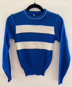 Vintage 1970's Block Striped Sweater. Size is labelled at Large, but fits as a Small. Fit is shrunken with wrist length sleeves. Crewneck. Blue sweater with 2 thick white, rugby style stripes across chest. No label to indicate content, but it feels like its acrylic or poly. In great condition. While in my 20s and 30s I worked as a designer in the fashion industry. Most of my career was spent at Opening Ceremony in New York and then in Philly at Urban Outfitters. I have since hung up that hat, did a total 180, and moved to amish country, Pa. During my time in the fashion world though, I collected some really great inspiration samples and I've decided it's time I open the vault and share my archive with .. you : )  Email me with questions on fit, or anything else. Rugby Vintage, In My 20s, Pull Bleu, Rugby Fashion, Pullover Outfit, My Career, The Fashion Industry, Blue Sweater, Fashion Industry