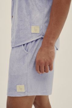 The Lavender Terry Shorts are cut from soft terry and appliquéd with our jacquard patch. Unlike heavier cotton shorts, it is lightweight and absorbs moisture quickly to help you stay cool on those humid days. These comfortable straight leg shorts feature an elasticated waistband with adjustable drawcord. 75% viscose, 25% polyester Elasticated waistband with cotton drawcord Polonio-branded patch Side pockets Back patch pocket Made in Italy Machine wash Model is 6ft with a 33in waist and is wearing a size M Cotton Moisture-wicking Leisure Shorts, Terry Cloth Shorts, Purple Moisture-wicking Shorts, Lavender Relaxed Fit Cotton T-shirt, Blue Cotton Pull-on Shorts, Terry Shorts, Knit Sweater Dress, Man Swimming, Short Jumpsuit