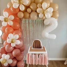 balloons and streamers are on display in the room