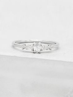 three stone diamond ring in white gold