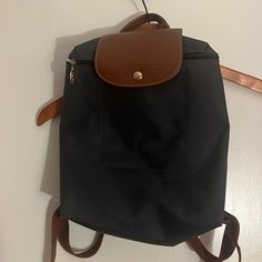 Longchamp Le Pliage Backpack In Black Nylon With Adjustable Straps Height 31cm (12.2 In) Width 24.5cm (9.65 In) Gusset 10cm (3.94 In). Longchamp Bags, Longchamp Le Pliage Backpack, Black Nylon, Black Nylons, Longchamp Le Pliage, Adjustable Straps, Bag Lady, Backpacks, Women Shopping