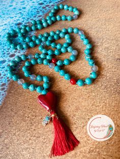 *One of a kind mala! *The Heart of Creative Serenity featuring handstrung turquoise, moonstone and coral beads with out signature heart pendant. Handmade Red Mala For Healing, Handmade Heart-shaped Jewelry For Meditation, Bohemian Necklaces With Gemstone Beads For Blessing, Turquoise Beaded Jewelry For Festival, Turquoise Jewelry With 8mm Beads For Festival, Handmade Artisan Mala As A Gift, Artisan Handmade Mala As A Gift, Bohemian Red Mala For Gift, Blue Gemstone Beads Mala As Gift