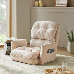 a recliner chair sitting on top of a white rug