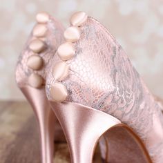 "Dress up your trip down the aisle with these 3 1/2\" custom wedding shoes. These shoes are shown in blush with a silver lace overlay, a hand made matching bow on the toe and hand made blush buttons on the back. Color Changes Love this design, but wishing it was in a different color? We can do that! Please use the dropdown menu to select a different color.  Base Shoe Style Changes We can adapt this design to a variety of base shoe styles, so if you'd prefer a flat, a wedge, or a towering stilett Vintage Inspired Wedding Shoes, Bow Wedding Shoes, Lace Wedding Heels, Simple Wedding Shoes, Blush Wedding Shoes, Dream Wedding Shoes, Lace Bridal Shoes, Heels Bow, Unique Wedding Shoes