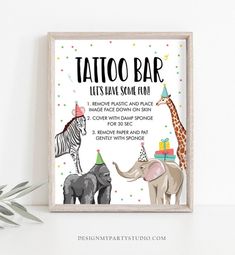 a poster with an elephant, giraffe and zebra on it that says tattoo bar