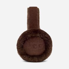 Featuring our world-renowned sheepskin and embroidered logo detailing, these ultra-soft earmuffs are iconically UGG®. Offering premium protection for your chilliest days. | Sheepskin earmuff. Self - 100% Sheepskin. Lining - Unlined. Water resistant. The UGG® Logo embroidered on ears. Imported. | UGG® Women's Sheepskin Embroidery Earmuff Earmuffs in Burnt Cedar Ugg Earmuffs, Cozy Accessories, Ear Muffs, Fall Birthday, Winter Aesthetic, Cold Weather Accessories, Leather Cleaning, Earmuffs, Soft Girl