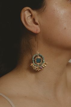 Make a statement with these beautiful handmade Estela Drop Earrings! The elegant, intricate design adds a special touch, and the colorful designs will be sure to stand out at any event. The intricate design adds a unique sophistication, while the dazzling colors will be sure to turn heads - the perfect accessory for any occasion. Details Size: 2.75" H x 1.25" W Elaboration Time: 2.5 hours Material: Faceted crystals Metal: gold plated, hypoallergenic, nickel free Technique: Herringbone technique Please Note: Each pair is made by hand and therefore one-of-a-kind.Care Instructions: This item should be kept in a dry space when not wearing. Statement Earrings Colorful, Colorful Wedding Jewelry, The Dazzling, Whimsical Jewelry, Wedding Jewellery Collection, Luxury Earrings, Bracelet Design, Classy Jewelry, Fantasy Jewelry