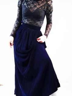 "Stunning glossy blue velvet vintage maxi skirt, of 100% rayon , very beautiful fabric Feels a lot Victorian inspired, in the 70s and early 80s this trend was all the rage. Very elegant, luxurious looking, designed to sit at the natural waistline (thinnest part of the waist) The colour is very dark, rich blue, I had to use flash and bright lights taking these pics for colour to show up in photos. In darker lighting or in the evening it may appear almost black. It has lining inside, and is well m Blue Velvet Skirt Outfit, Luxury Velvet Elegant Skirt, Long Black Velvet Skirt, Crushed Velvet Maxi Skirt, 50s Pencil Dress, Blue Velvet Skirt, Vintage Maxi Skirt, Lace Nightgown, Velvet Maxi