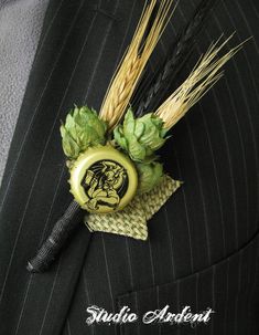 a man in a suit and tie with a boutonniere on his lapel