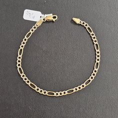 Weight : 2.15 Grams (Approximate) Length : 7 Inch Width : 3.3 Mm Metal : 14k Solid Gold Stamped : 14k Classic Gold Sterling Silver Tennis Bracelet, Gold Sterling Silver Tennis Bracelet With Diamond Cut, Elegant Sterling Silver Bracelet With Figaro Chain, Luxury 14k Gold Bracelet With Figaro Chain, 14k Gold Bracelet With Figaro Chain, Elegant 14k Gold Bracelet With Figaro Chain, Formal White Gold Bracelets With Figaro Chain, Formal White Gold Bracelet With Figaro Chain, 14k Stamped Gold Bracelet Fine Jewelry