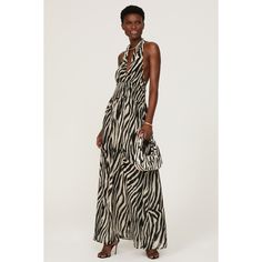 Black zebra georgette (100% Polyester). Maxi. Sleeveless. V-neck. Back zipper closure. 58" from shoulder to hemline. Imported. Printed Halter Dress, Rent The Runway, Closet Designs, Zebra Print, Black Print, Smocking, Halter Dress, V Neck, Zipper