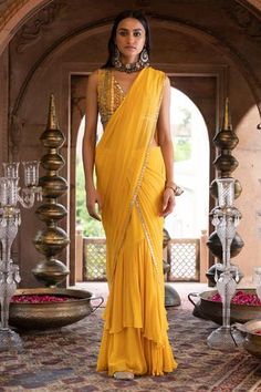 Shop for Chhavvi Aggarwal Yellow Shantoon Pre-draped Ruffle Saree With Blouse for Women Online at Aza Fashions Ruffle Sarees, Draped Saree, Net Blouses, Ruffle Saree, Drape Saree, Yellow Saree, Printed Sleeveless Blouse, Sequin Embroidery, Beaded Neckline