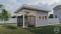 a small house with a dog kennel in the yard