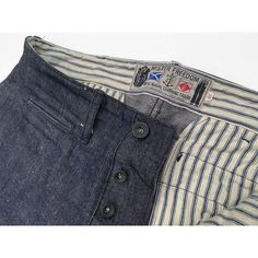 *This item is eligible for exchange or store credit only, no refunds. SPECS Fabric: “Okinawa 301” denim, 12 Oz. left-hand twill indigo denim, “hairy” and slubby, solid white selvedge ID. Milled in Japan on narrow shuttle looms, from a blend of 20% Okinawan recycled sugar cane fibers and 80% cotton. * Pattern inspired by vintage 1940’s US Army chino trousers, custom-made military garments and early European tailoring.* Stripe ticking 100% cotton pocketing and waistband facing.* Button fly, black- Tailored Sportsman, Rangers Shirt, Military Cap, Indigo Denim, Vintage Inspired Outfits, Sugar Cane, Selvedge Denim, Chino Trousers, Painted Metal